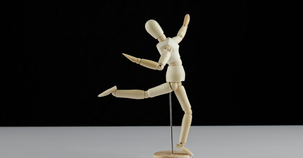 Artistic wooden mannequin striking a dance pose on a black background.